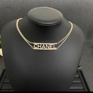 Chanel Gold Necklace with Logo Pendant